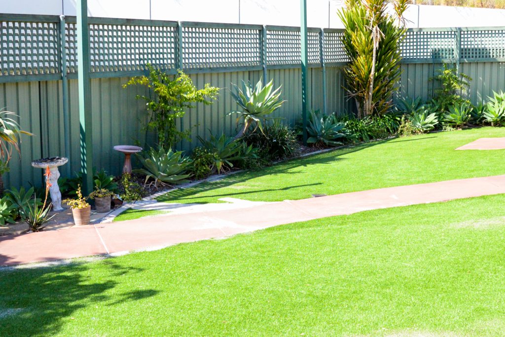 Lyrebird backyard with green grass and pathway
